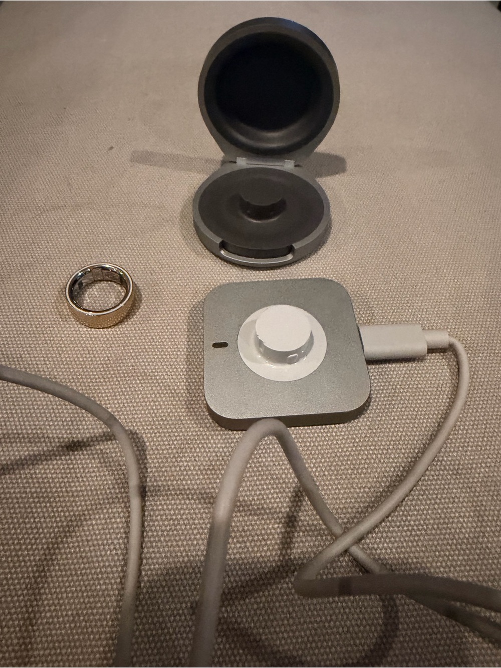 Oura ring size 7 gold with chargers and cord.